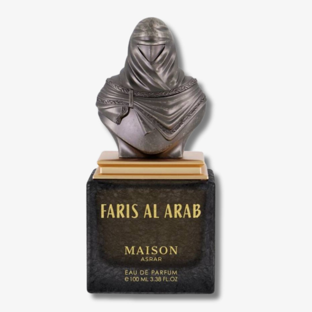 Perfume bottle with a decorative figure on top labeled 'Faris Al Arab' by 'Maison Assar'.