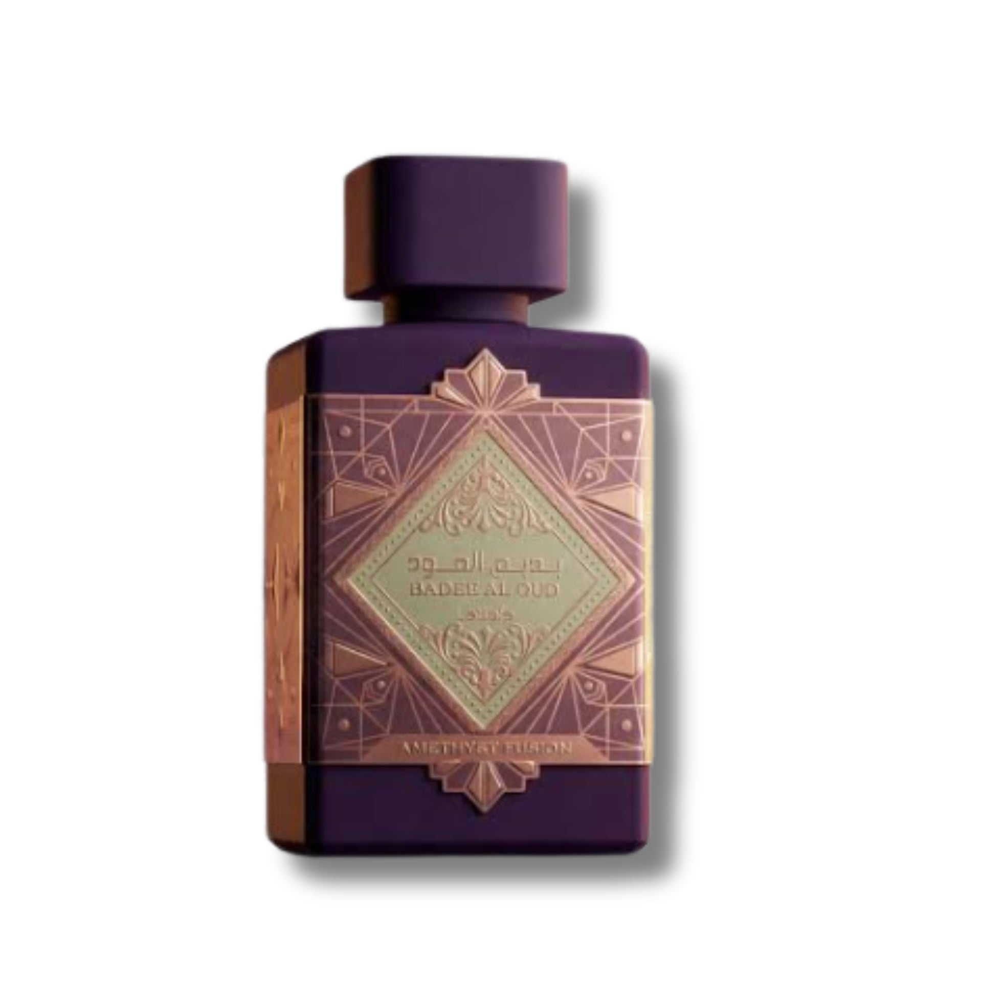 A rectangular purple perfume bottle with a matching purple cap, featuring a metallic rose gold geometric label with Arabic text and a diamond-shaped emblem, set against a plain white background.