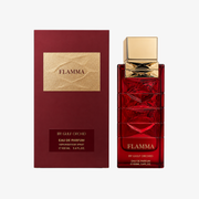 By Gulf Orchid Flamma Eau de Parfum 100ml bottle next to its dark red packaging box with a gold foil label, on a light gray background.