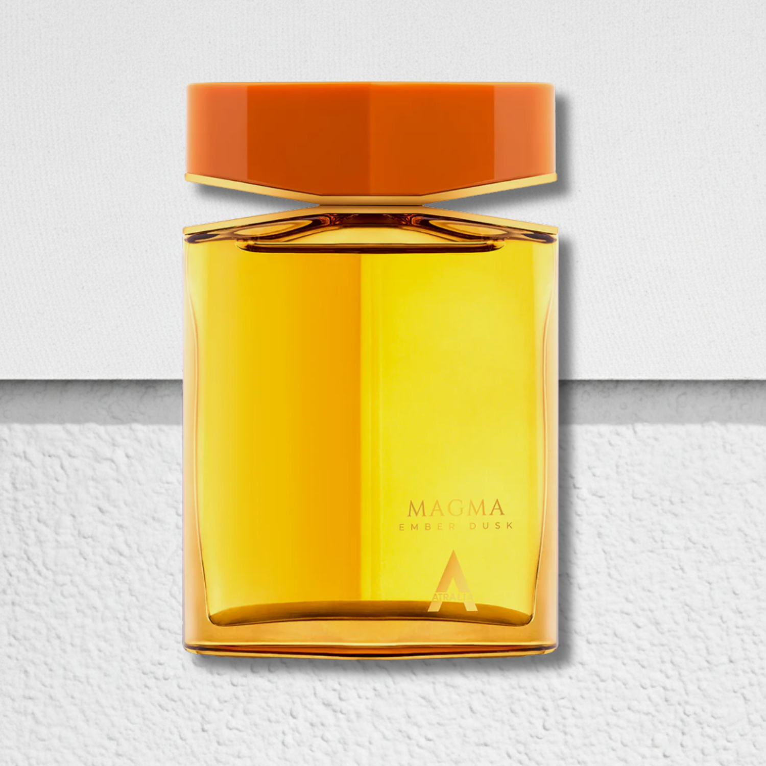 Yellow glass bottle with orange cap on a light gray background