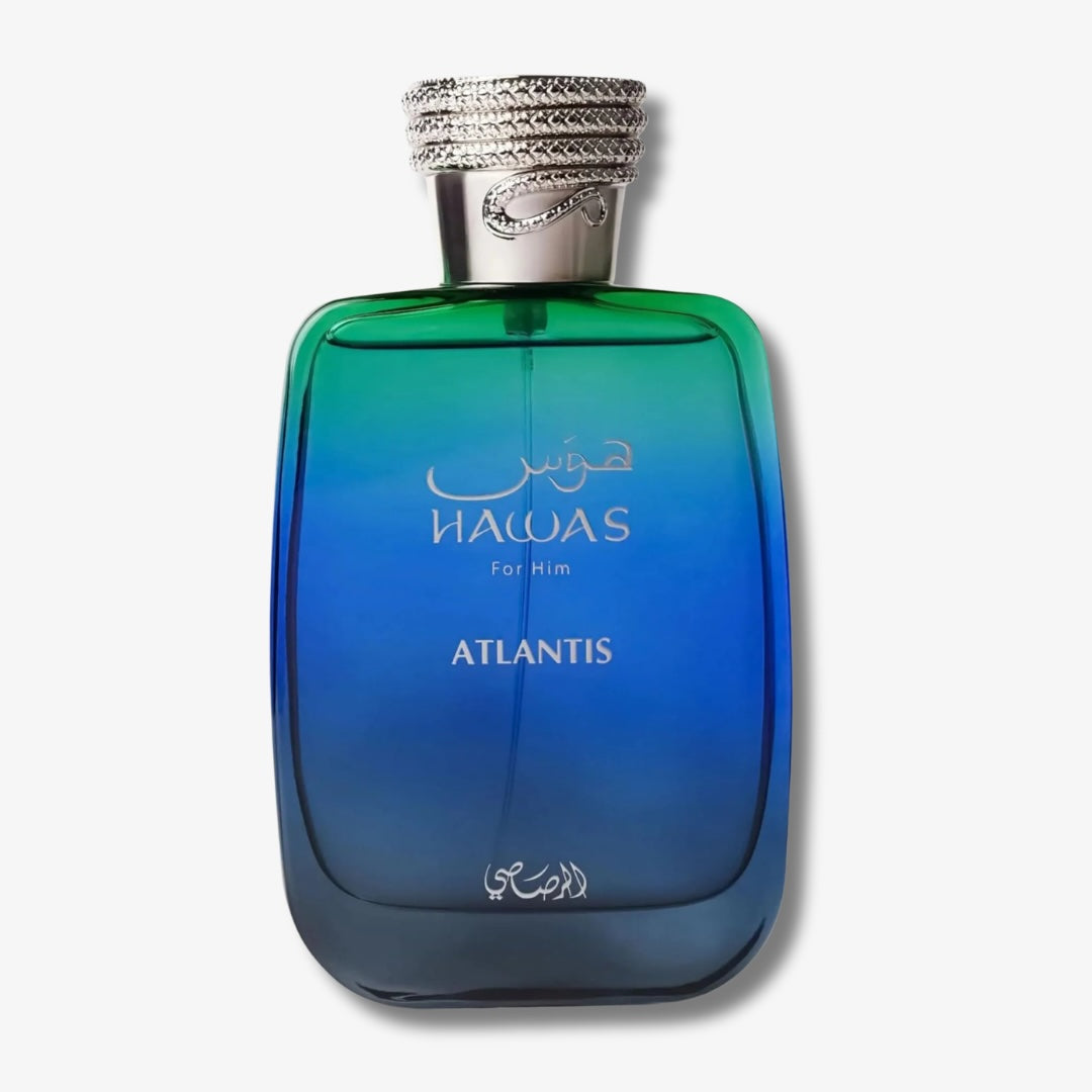 A bottle of Nawas Atlantis cologne for men, featuring a gradient blue and green glass bottle with a textured silver cap, set against a plain light gray background.